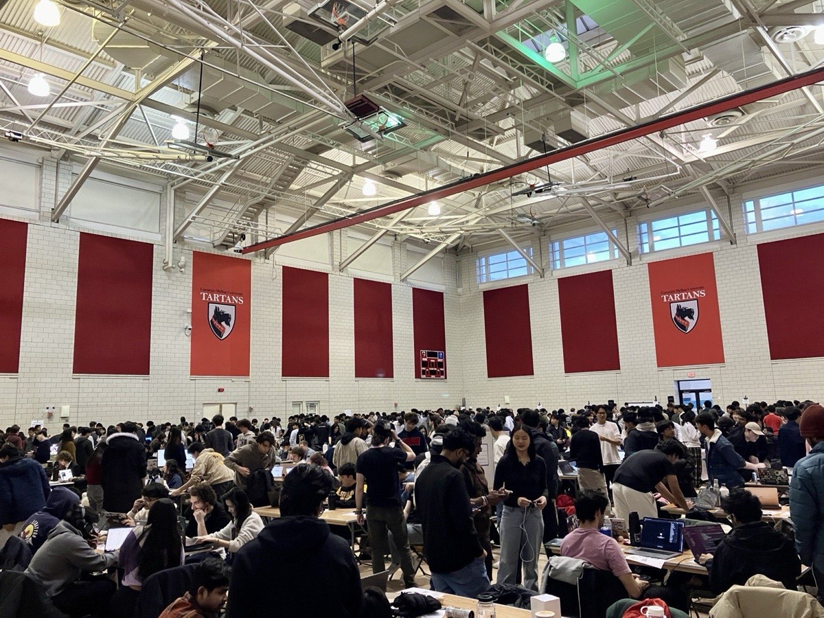 Teams presenting projects at the TartanHacks judging expo